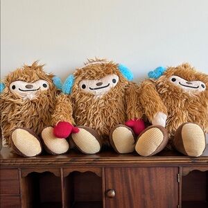 Quatchi Souvenir Adorable 13” Plush Yeti Trio with Blue Ear Muffs